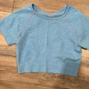 Never wear it. It’s a cropped workout top cute color just don’t wear it